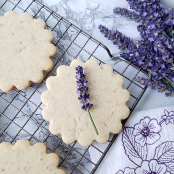 Lavender shortbread sugar cookies on a cooling rack