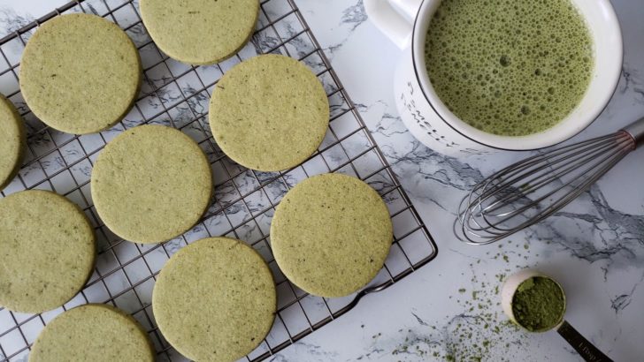 Matcha green tea shortbread sugar cookies on a cooling rack.