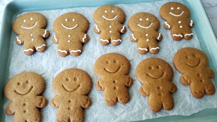 Gingerbread men on a baking sheet. 